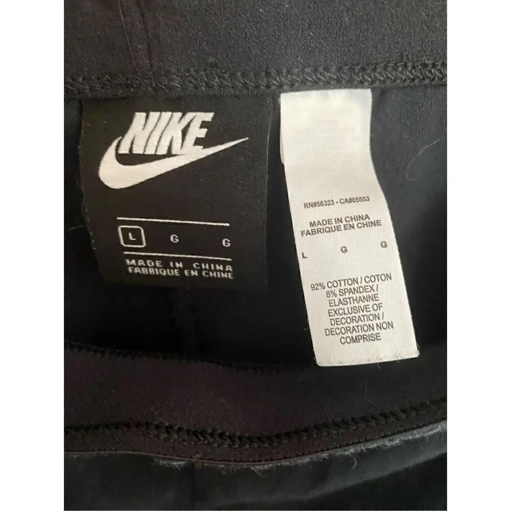 Nike girls, black elastic waist logo leggings, size large